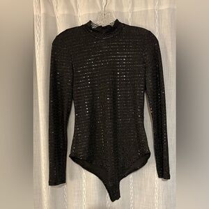 Iris, shimmering body suit with snap crotch and mock turtleneck. Sz M